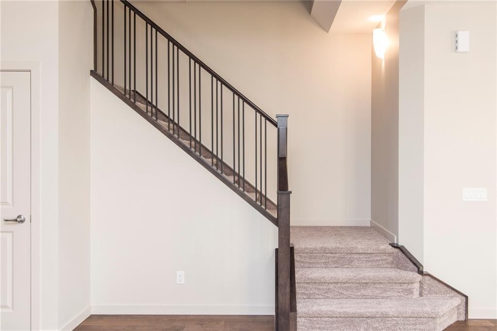 504 Kitstone Gate, Carstairs, AB - Indoor Photo Showing Other Room