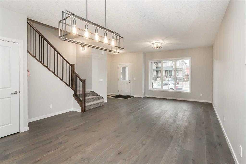 504 Kitstone Gate, Carstairs, AB - Indoor Photo Showing Other Room