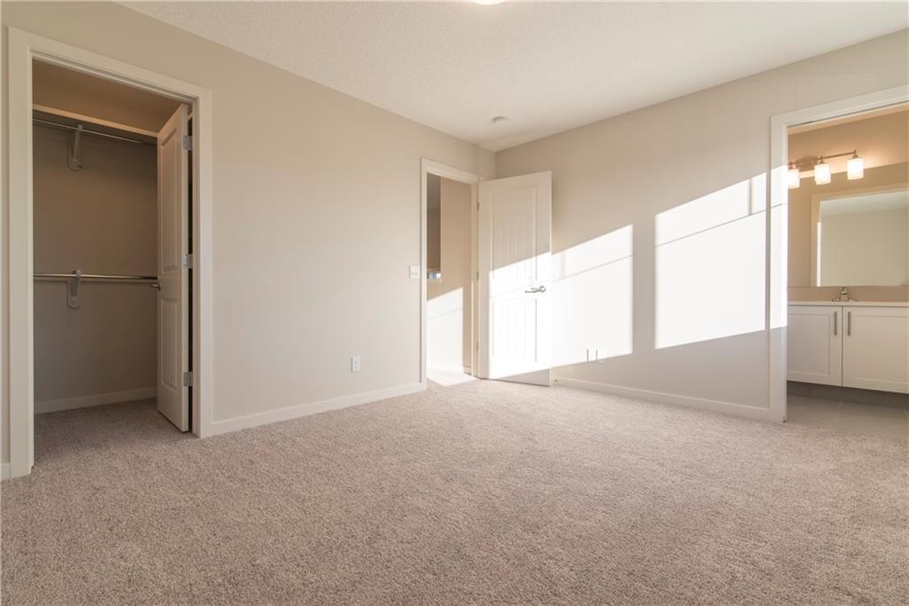 504 Kitstone Gate, Carstairs, AB - Indoor Photo Showing Other Room