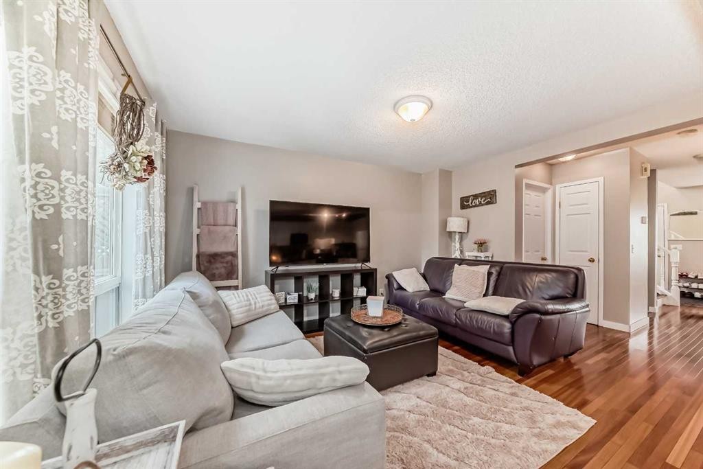 132 Hidden Hills Road Nw, Calgary, AB - Indoor Photo Showing Living Room
