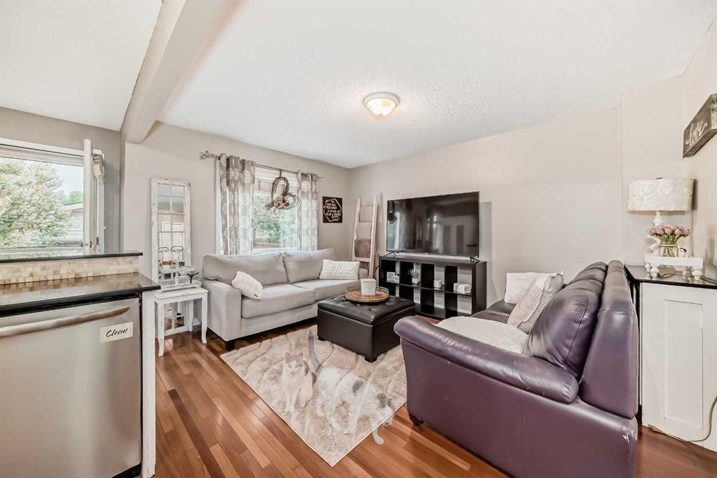 132 Hidden Hills Road Nw, Calgary, AB - Indoor Photo Showing Living Room
