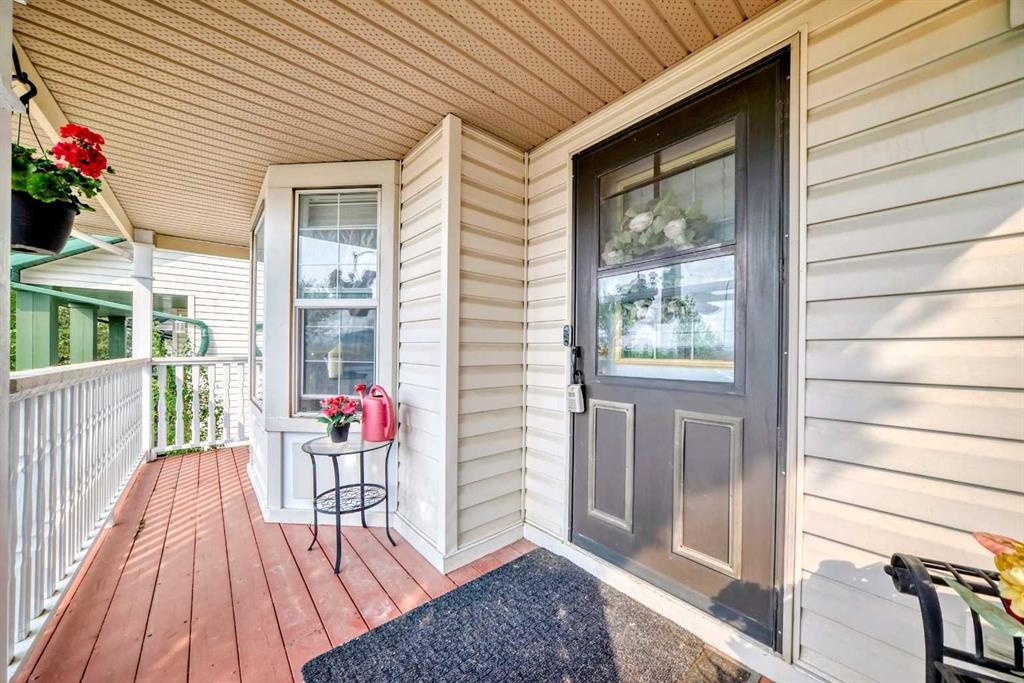 132 Hidden Hills Road Nw, Calgary, AB - Outdoor With Deck Patio Veranda With Exterior