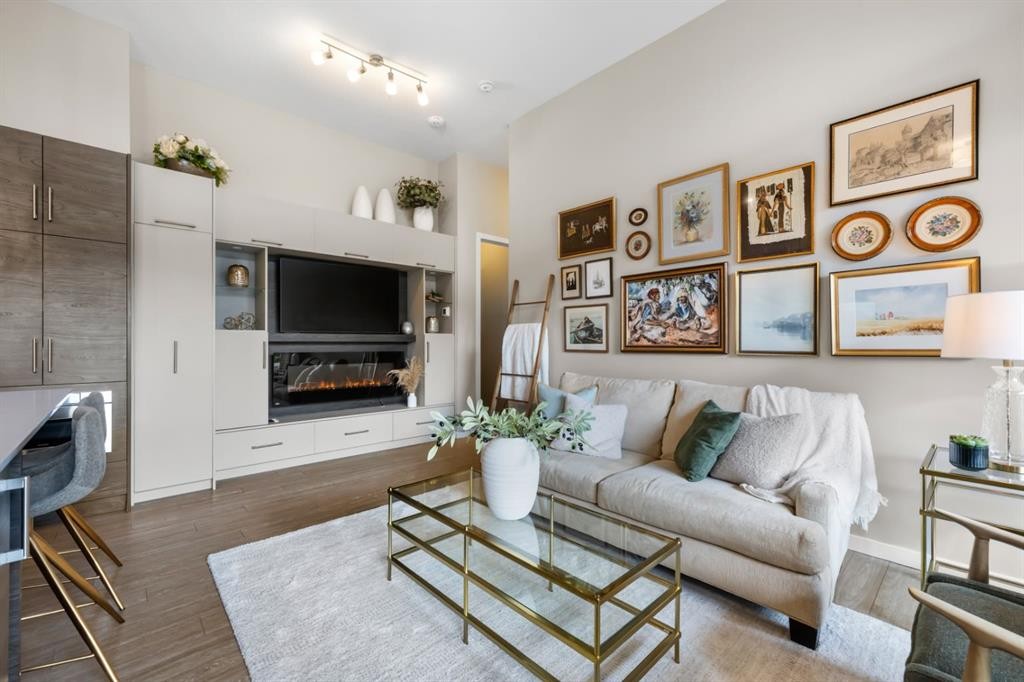 128-122 Mahogany Centre Se, Calgary, AB - Indoor Photo Showing Living Room With Fireplace