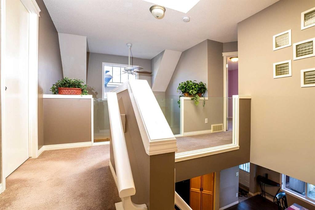 213 Tuscany Valley Green Nw, Calgary, AB - Indoor Photo Showing Other Room