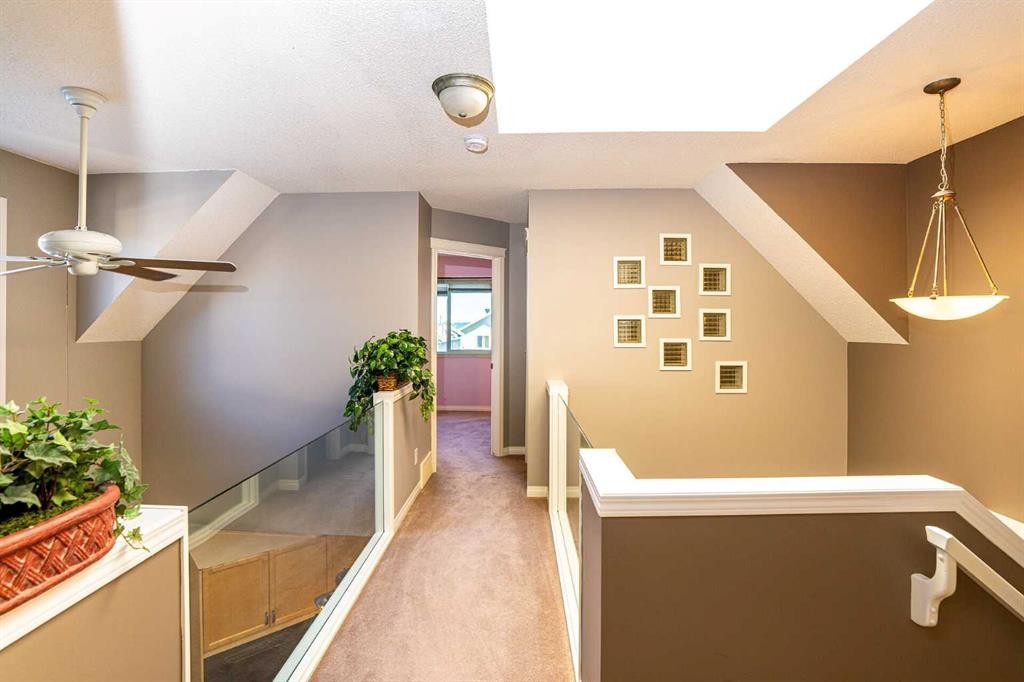 213 Tuscany Valley Green Nw, Calgary, AB - Indoor Photo Showing Other Room