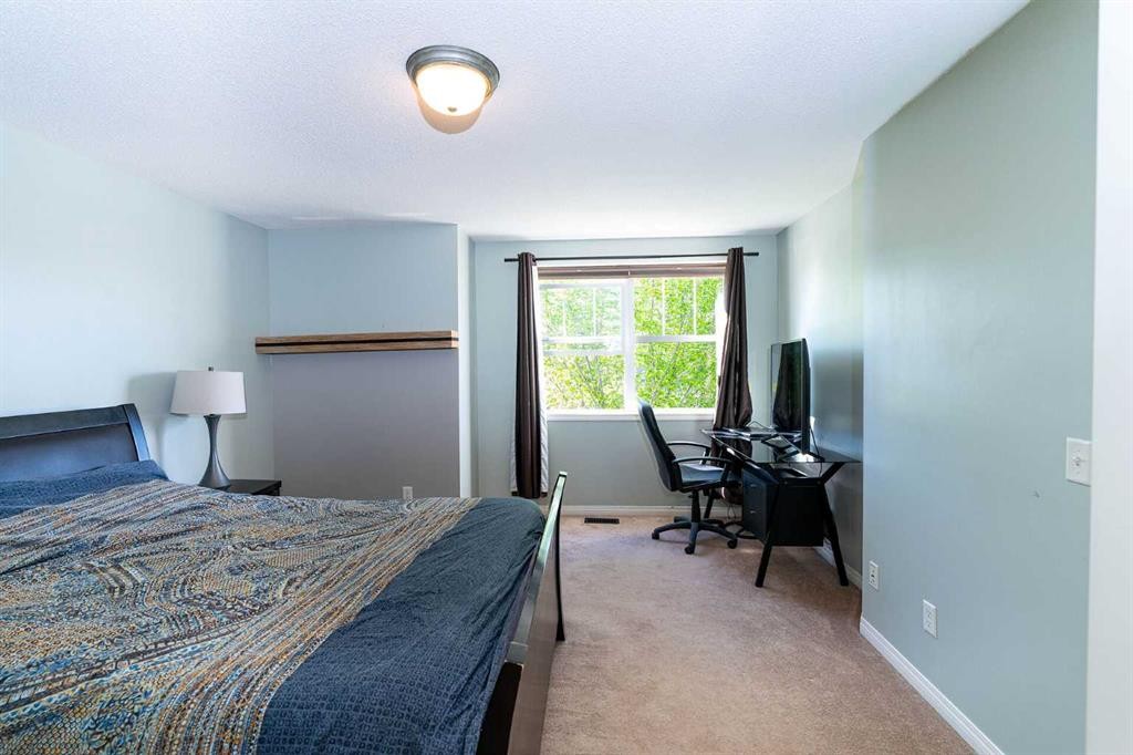 213 Tuscany Valley Green Nw, Calgary, AB - Indoor Photo Showing Bedroom
