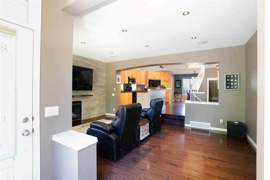 213 Tuscany Valley Green Nw, Calgary, AB - Indoor With Fireplace