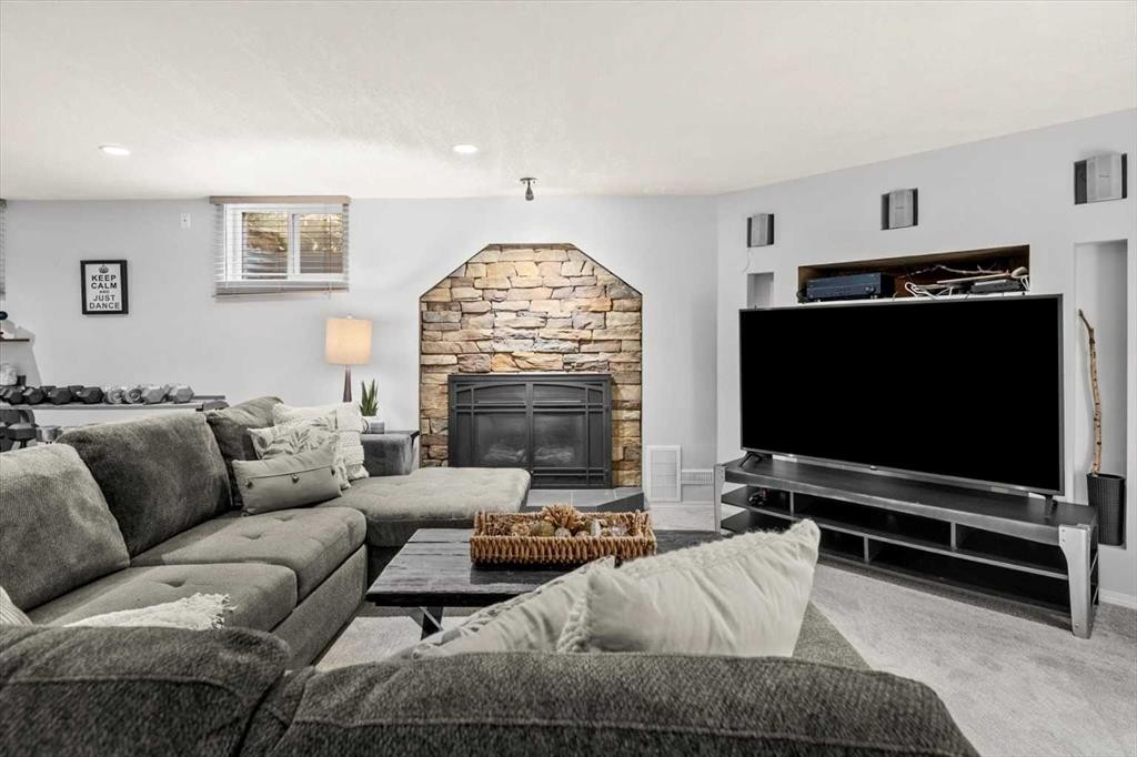 784 Acadia Drive Se, Calgary, AB - Indoor Photo Showing Living Room With Fireplace