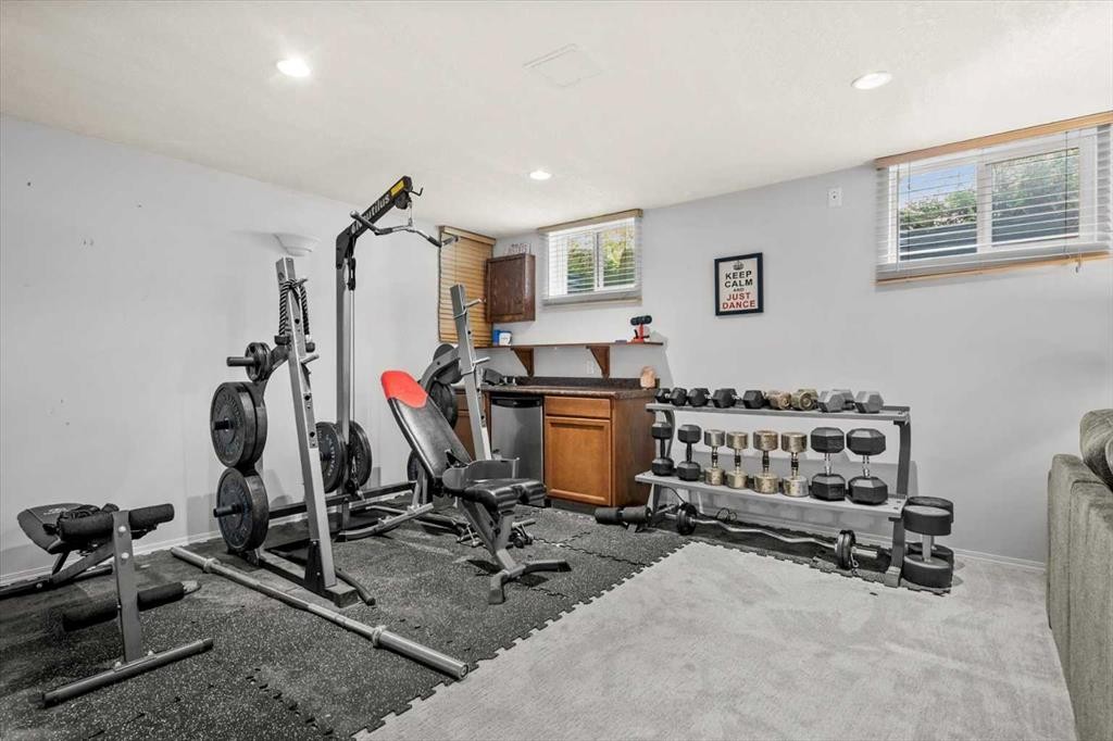 784 Acadia Drive Se, Calgary, AB - Indoor Photo Showing Gym Room