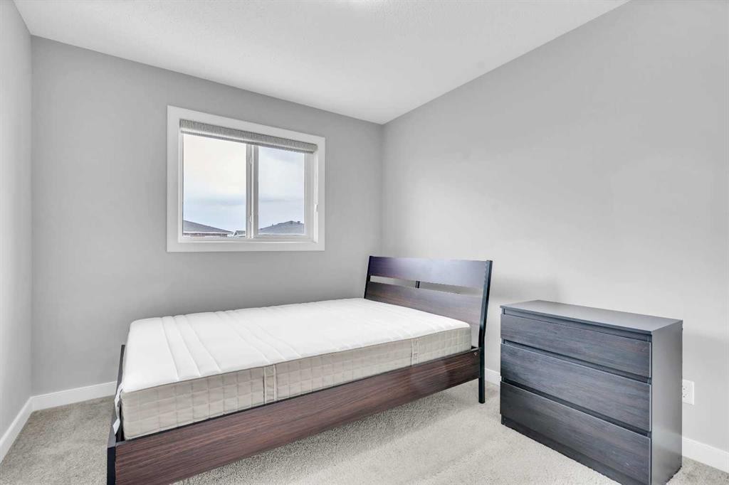 52 Red Embers Manor Ne, Calgary, AB - Indoor Photo Showing Bedroom