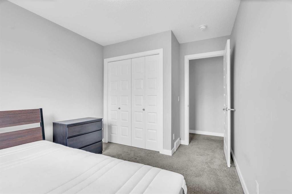 52 Red Embers Manor Ne, Calgary, AB - Indoor Photo Showing Bedroom