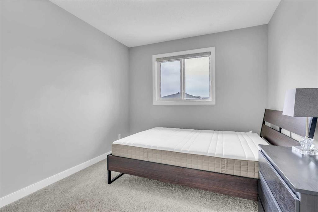 52 Red Embers Manor Ne, Calgary, AB - Indoor Photo Showing Bedroom