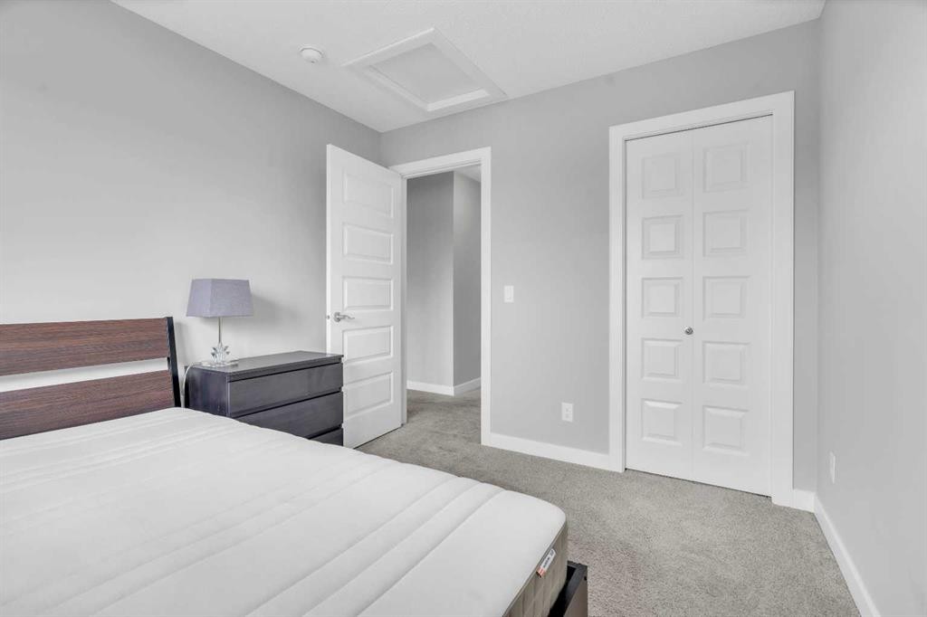 52 Red Embers Manor Ne, Calgary, AB - Indoor Photo Showing Bedroom