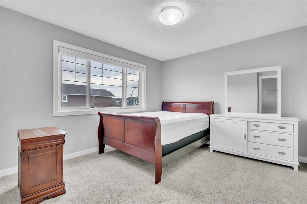 52 Red Embers Manor Ne, Calgary, AB - Indoor Photo Showing Bedroom