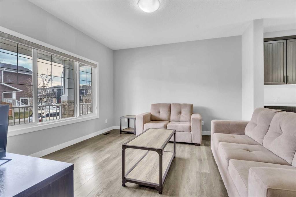 52 Red Embers Manor Ne, Calgary, AB - Indoor Photo Showing Living Room