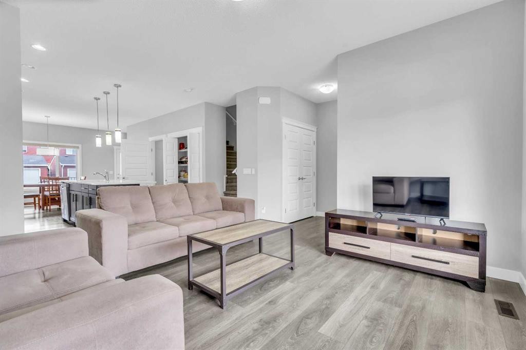 52 Red Embers Manor Ne, Calgary, AB - Indoor Photo Showing Living Room