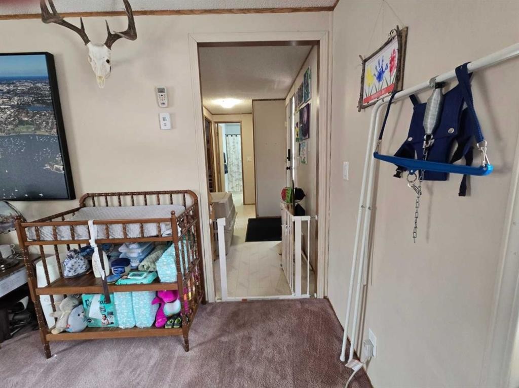 5A-6101 20 Avenue, Coleman, AB - Indoor Photo Showing Other Room