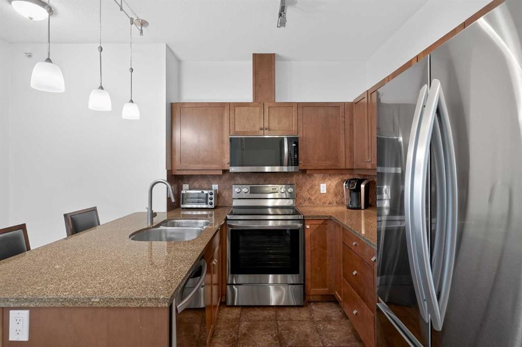 316-30 Cranfield Link Se, Calgary, AB - Indoor Photo Showing Kitchen With Stainless Steel Kitchen With Double Sink With Upgraded Kitchen