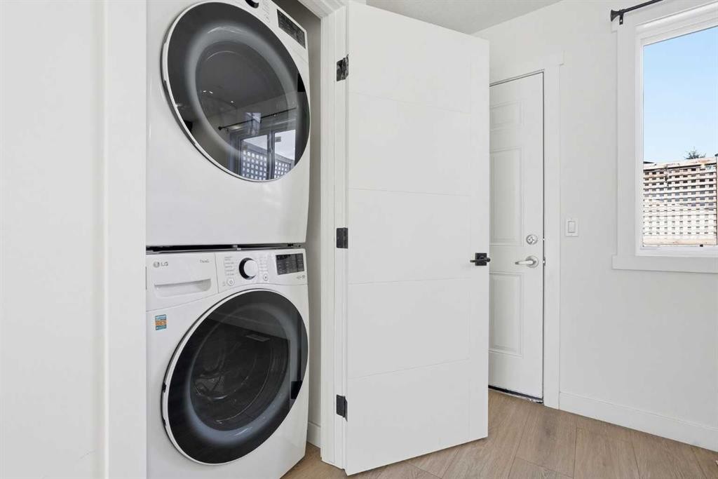 58 Taraglen Road Ne, Calgary, AB - Indoor Photo Showing Laundry Room