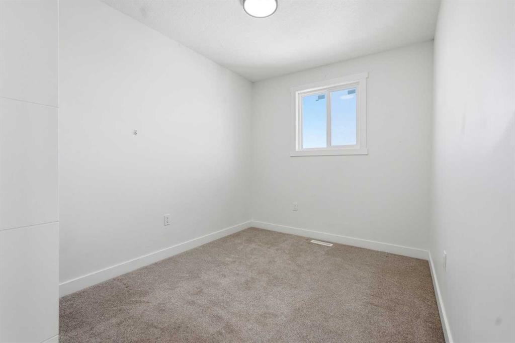 58 Taraglen Road Ne, Calgary, AB - Indoor Photo Showing Other Room