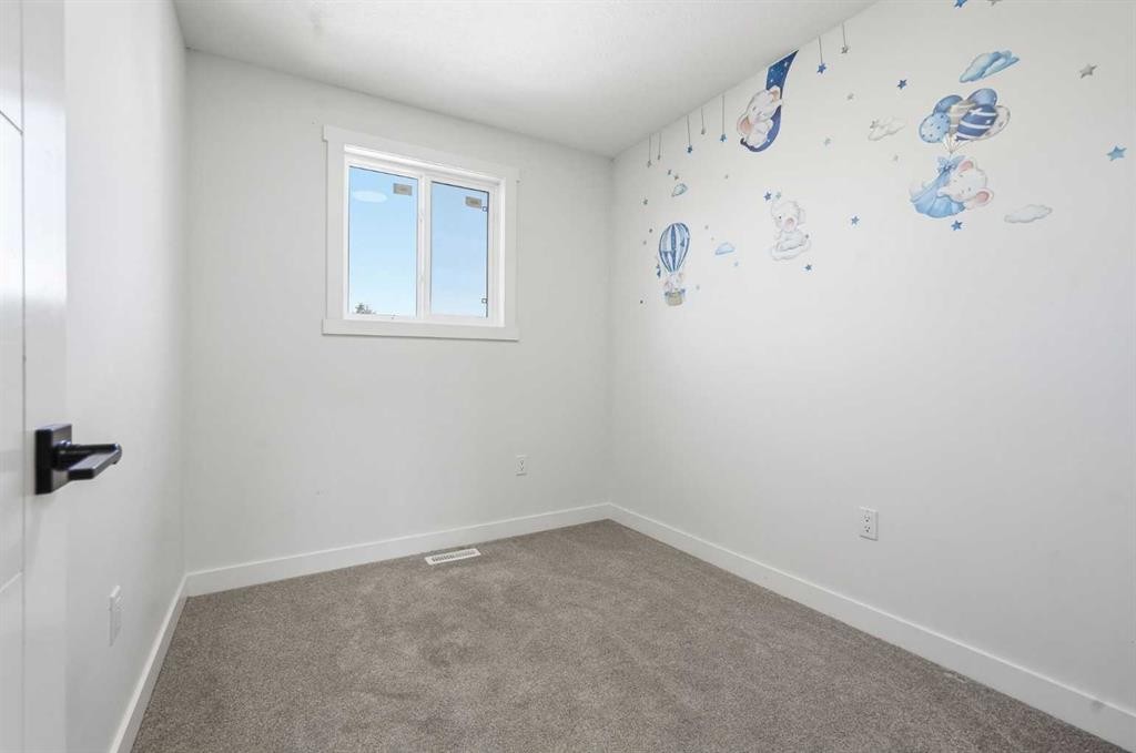 58 Taraglen Road Ne, Calgary, AB - Indoor Photo Showing Other Room