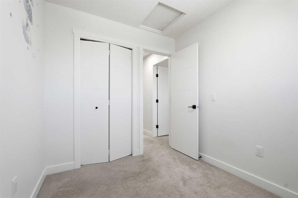 58 Taraglen Road Ne, Calgary, AB - Indoor Photo Showing Other Room