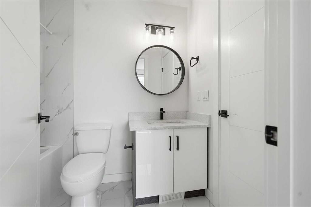 58 Taraglen Road Ne, Calgary, AB - Indoor Photo Showing Bathroom