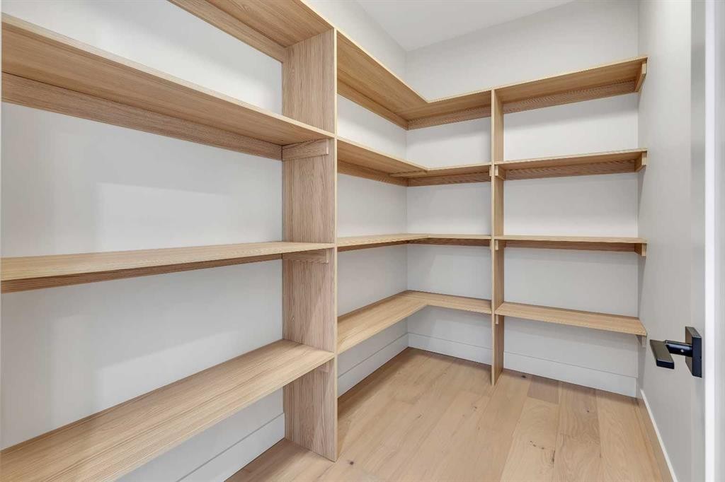 342 Normandy Drive Sw, Calgary, AB - Indoor With Storage