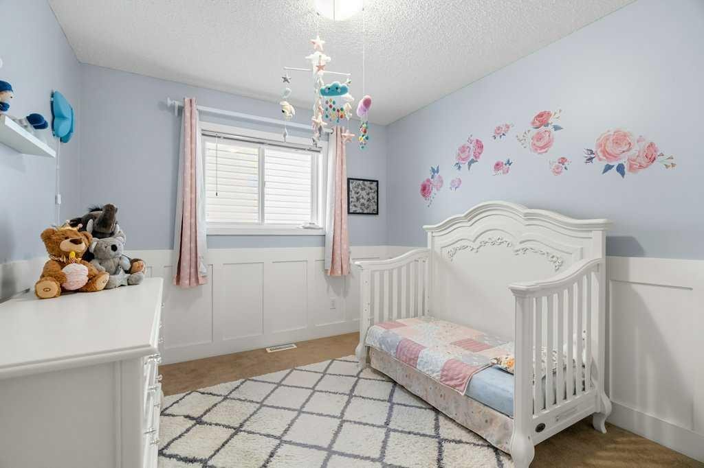 140 Panamount Circle Nw, Calgary, AB - Indoor Photo Showing Bedroom