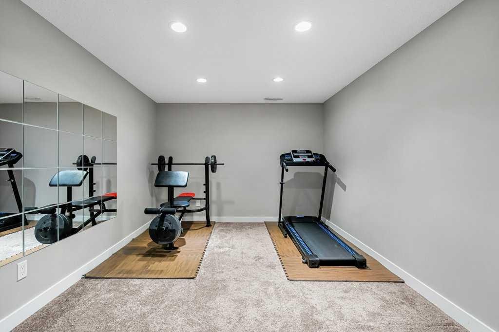 140 Panamount Circle Nw, Calgary, AB - Indoor Photo Showing Gym Room