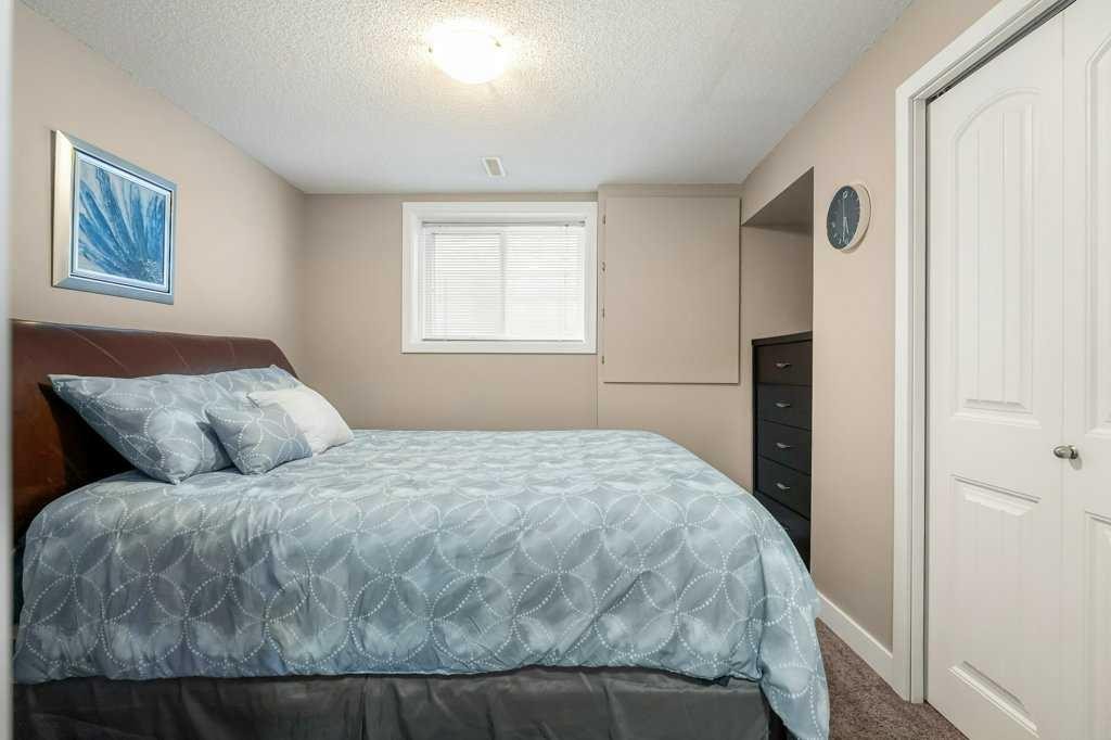 140 Panamount Circle Nw, Calgary, AB - Indoor Photo Showing Bedroom