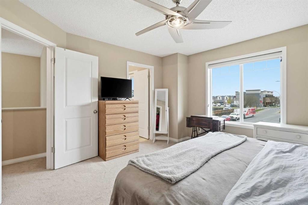 383 Fireside Place, Cochrane, AB - Indoor Photo Showing Bedroom