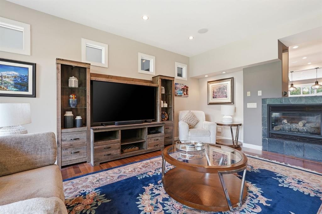 2409 Westmount Road Nw, Calgary, AB - Indoor Photo Showing Living Room With Fireplace
