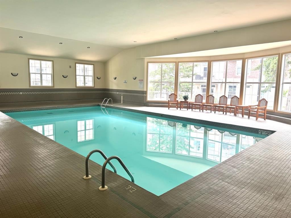 261-3000 Marda Link Sw, Calgary, AB - Indoor Photo Showing Other Room With In Ground Pool