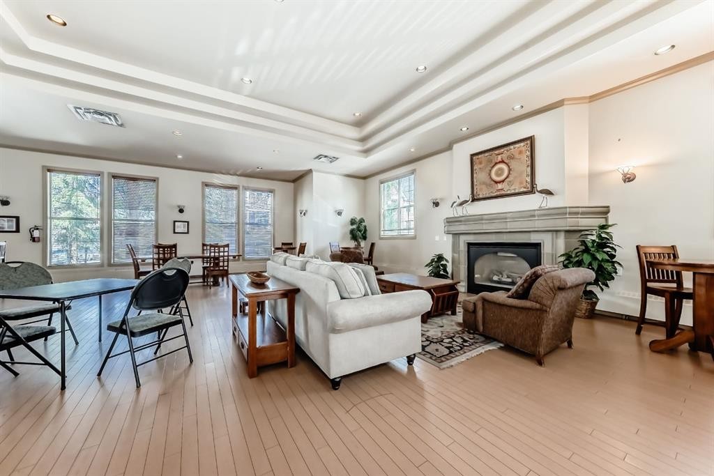 261-3000 Marda Link Sw, Calgary, AB - Indoor Photo Showing Other Room With Fireplace