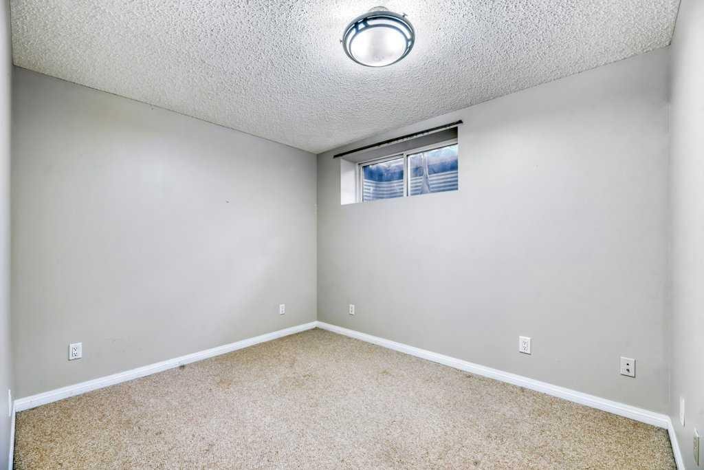 126 Covebrook Place Ne, Calgary, AB - Indoor Photo Showing Other Room