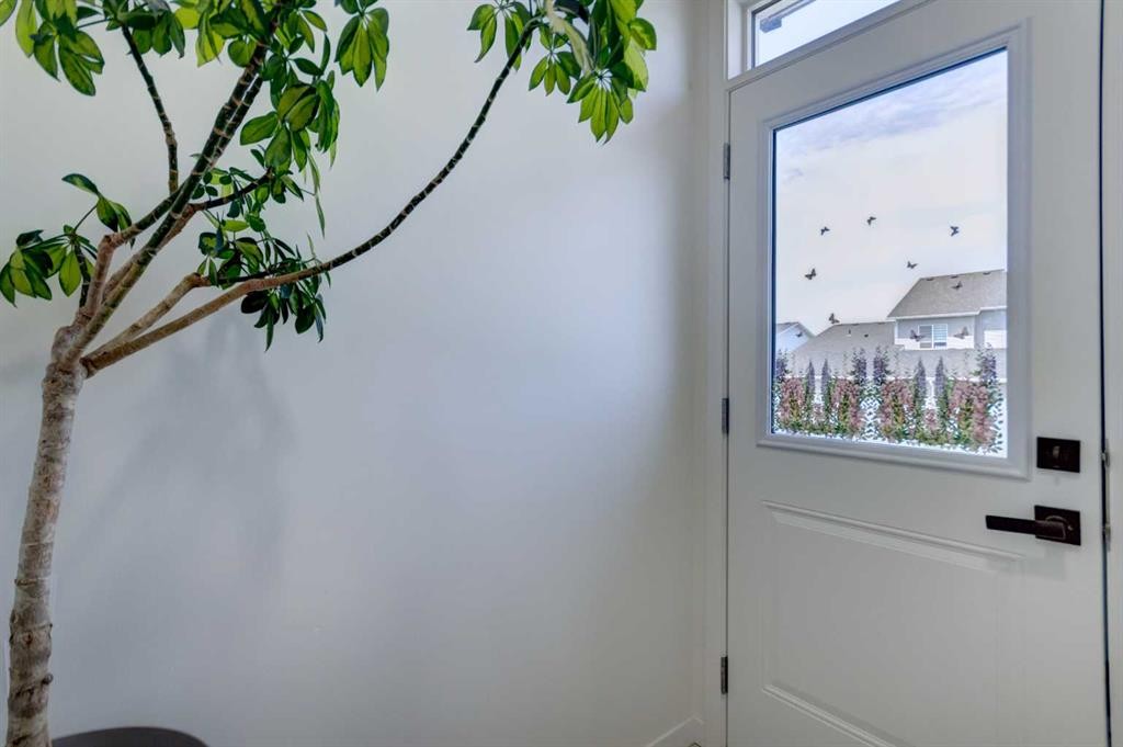 30 Creekside Manor Sw, Calgary, AB - Indoor Photo Showing Other Room