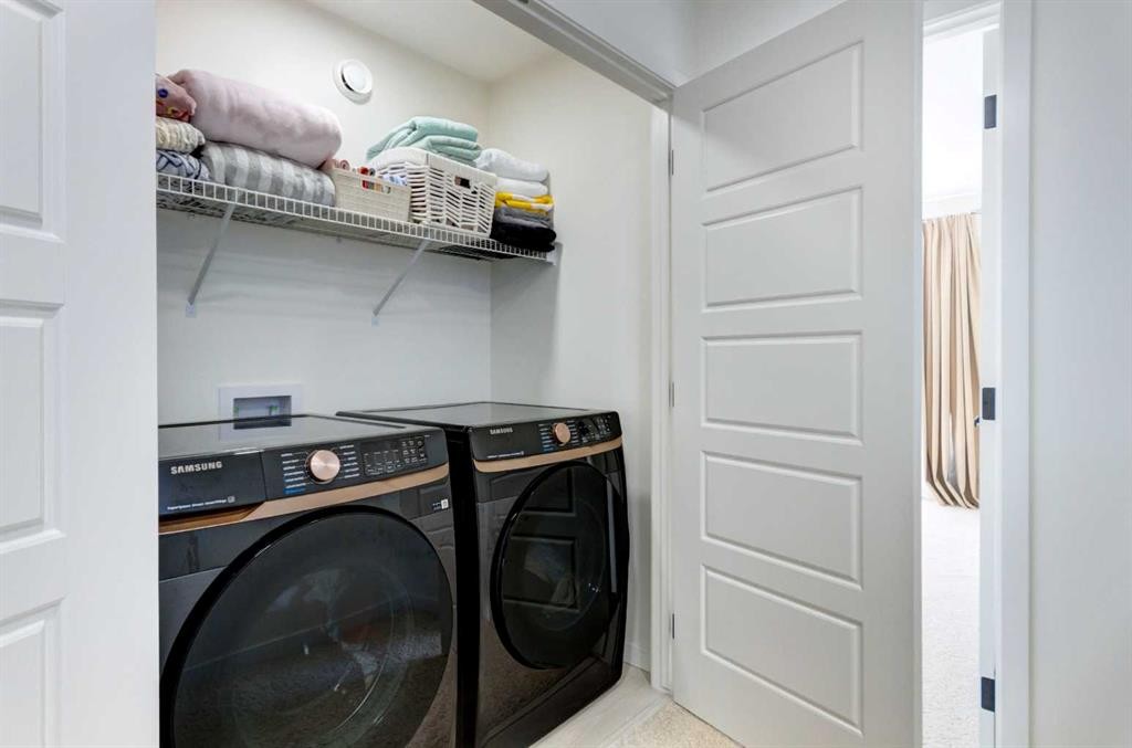 30 Creekside Manor Sw, Calgary, AB - Indoor Photo Showing Laundry Room