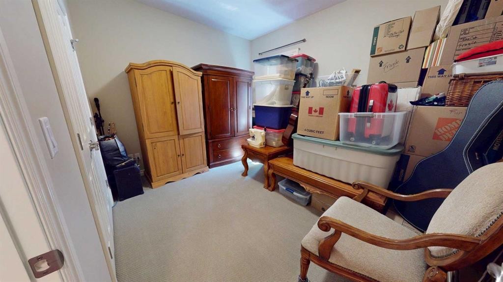 4-7001 52 Street, Lacombe, AB - Indoor Photo Showing Other Room