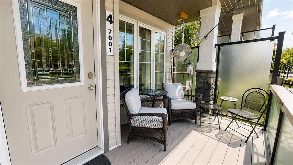 4-7001 52 Street, Lacombe, AB - Outdoor With Deck Patio Veranda With Exterior