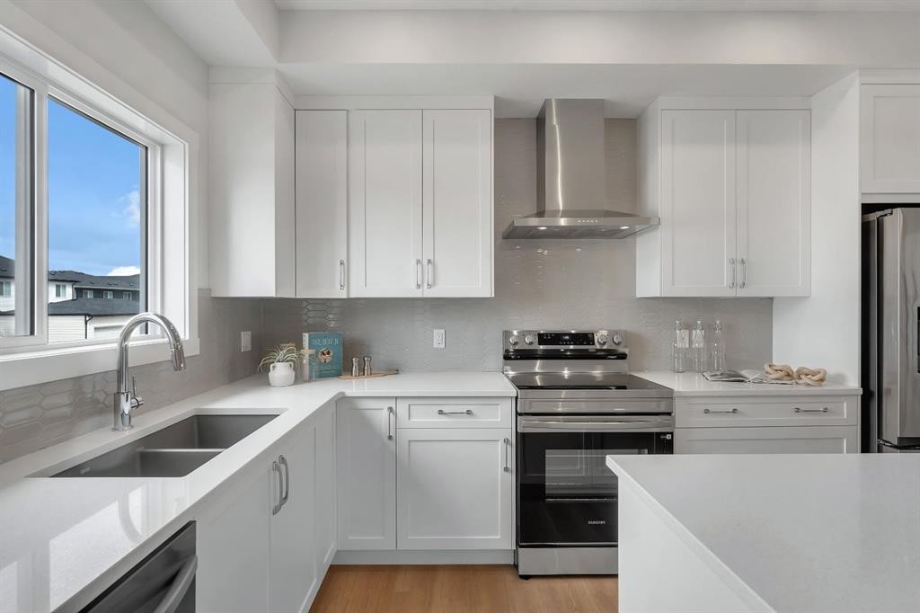 416 Lewiston Landing Ne, Calgary, AB - Indoor Photo Showing Kitchen With Double Sink With Upgraded Kitchen