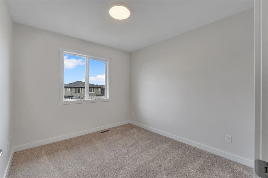 416 Lewiston Landing Ne, Calgary, AB - Indoor Photo Showing Other Room