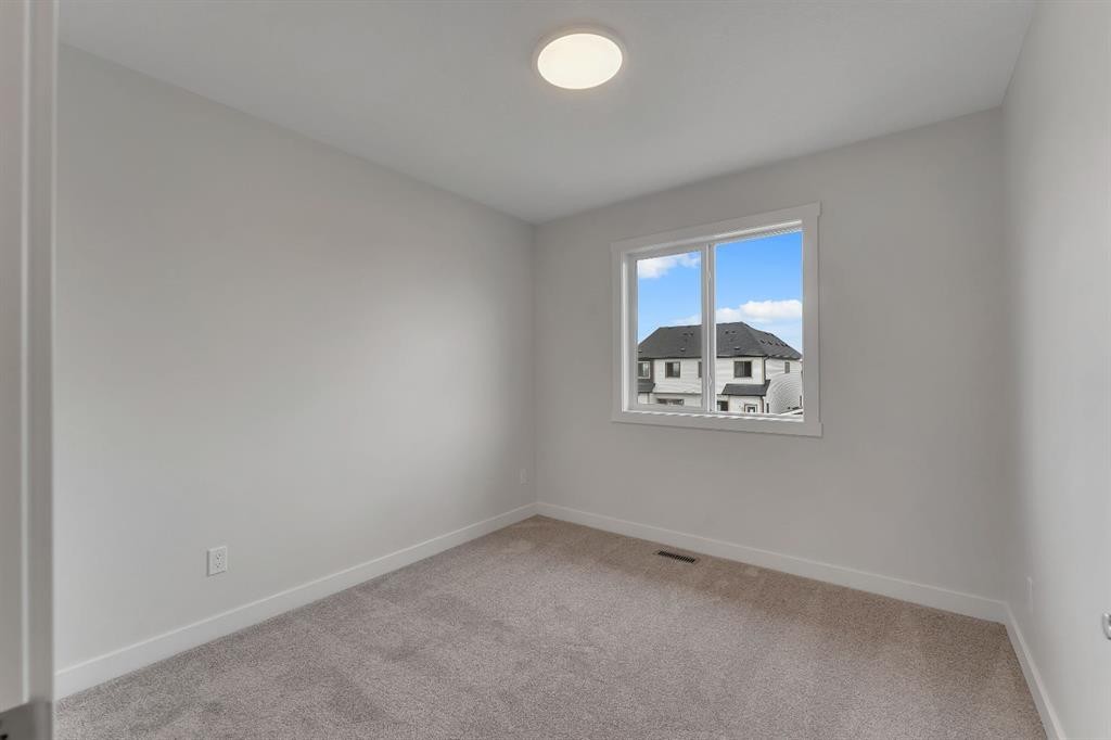 416 Lewiston Landing Ne, Calgary, AB - Indoor Photo Showing Other Room