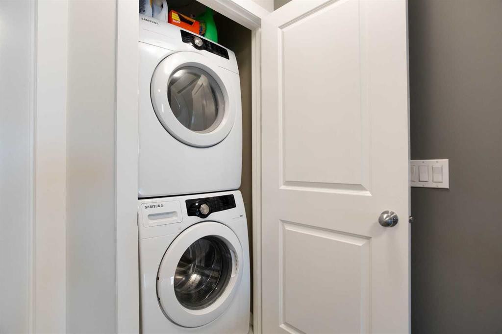 88 New Brighton Point Se, Calgary, AB - Indoor Photo Showing Laundry Room