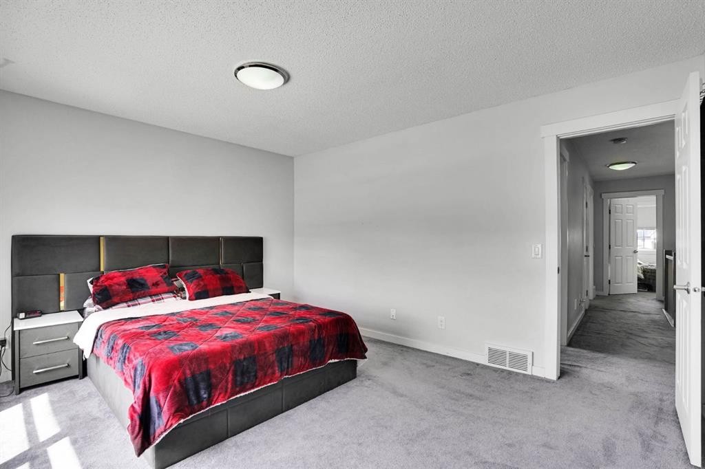63 Saddlemont Crescent Ne, Calgary, AB - Indoor Photo Showing Bedroom