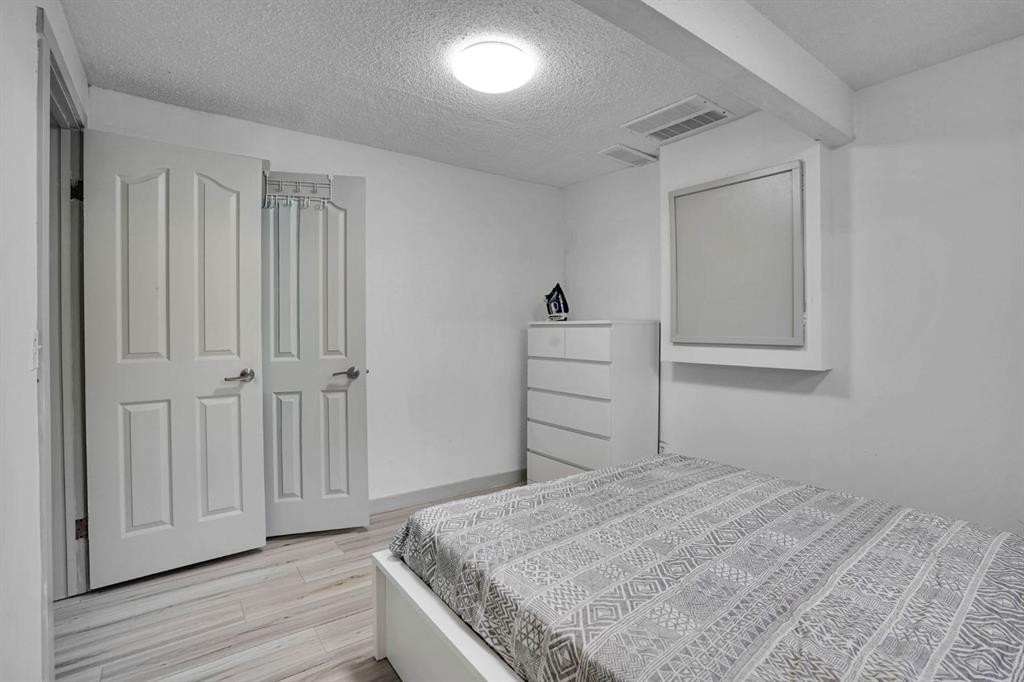 63 Saddlemont Crescent Ne, Calgary, AB - Indoor Photo Showing Bedroom
