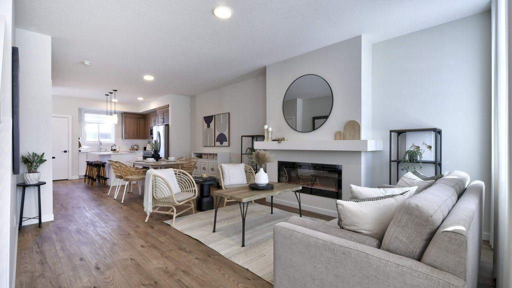 311 Wolf River Drive Se, Calgary, AB - Indoor Photo Showing Living Room With Fireplace