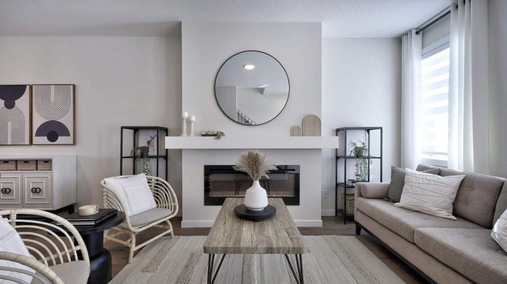 311 Wolf River Drive Se, Calgary, AB - Indoor Photo Showing Living Room With Fireplace