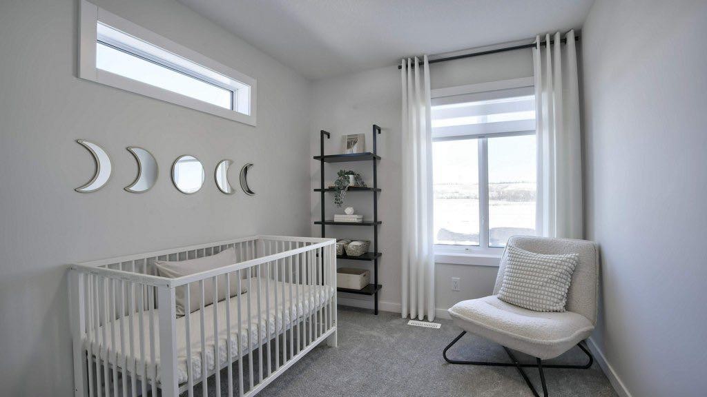 311 Wolf River Drive Se, Calgary, AB - Indoor Photo Showing Bedroom