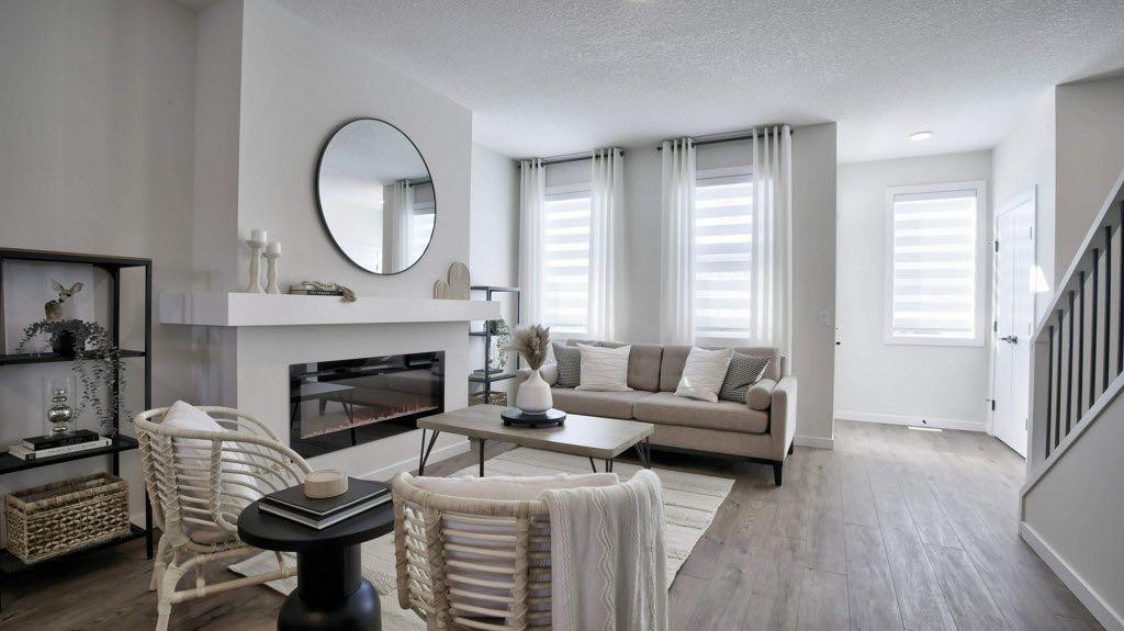 311 Wolf River Drive Se, Calgary, AB - Indoor Photo Showing Living Room With Fireplace